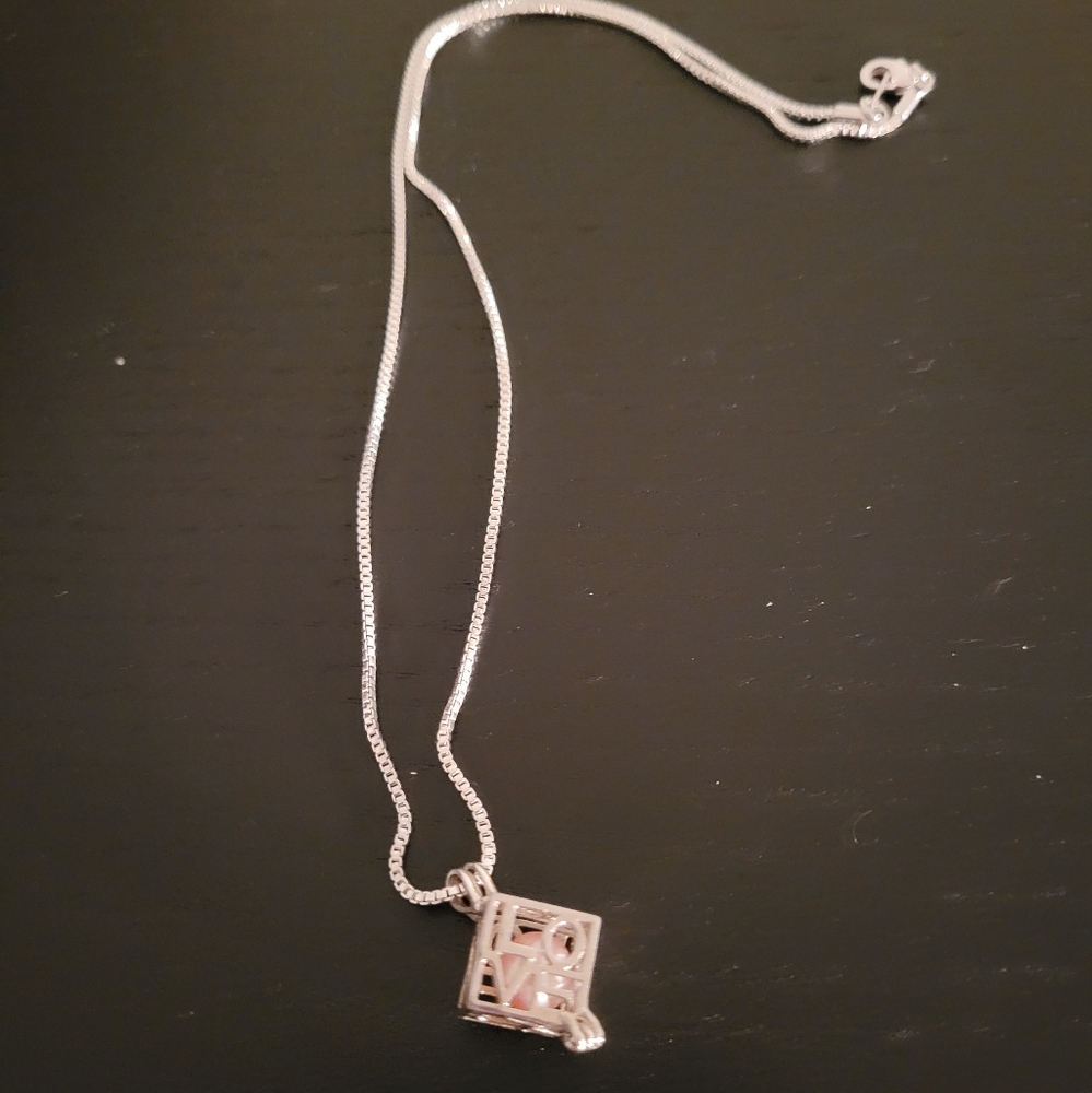 Vantel Pearl "Love" cage necklace with pink pearl